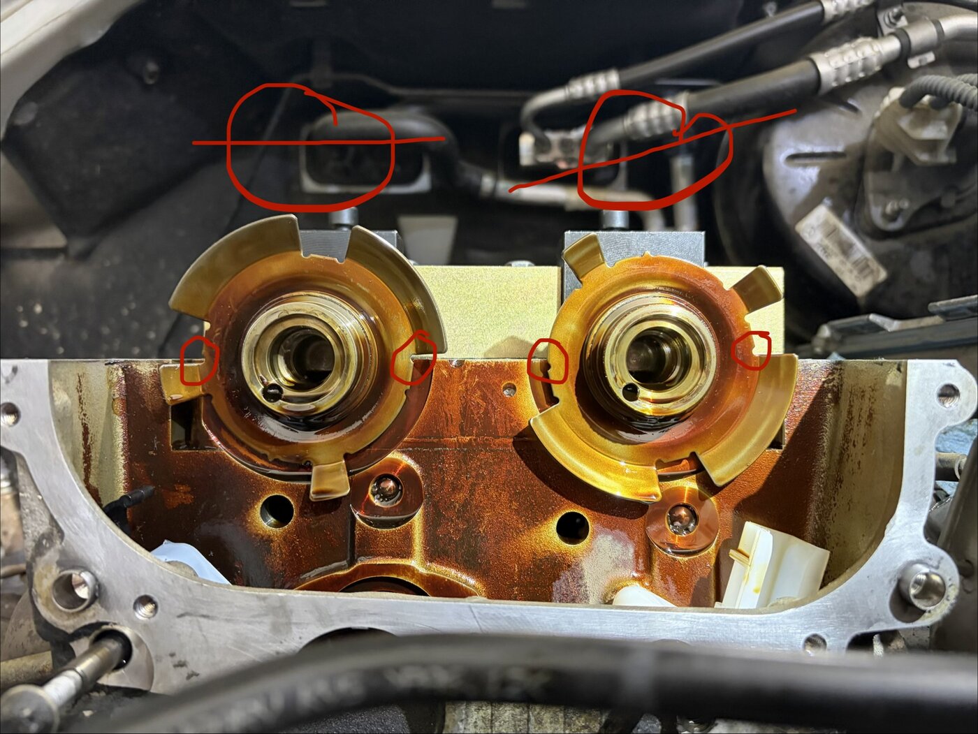 Comparison of two Mercedes Metris cam phasers showing timing marks out of alignment